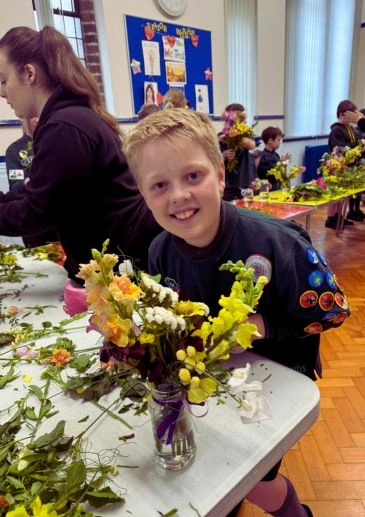 Cubs in Liverpool learning how to arrange flowers